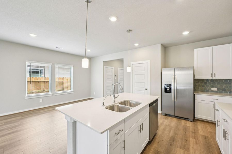 Photo is not of the actual home, but is an inspirational photo of builder’s model home and may depict options, furnishings, and/or decorator features that are not included