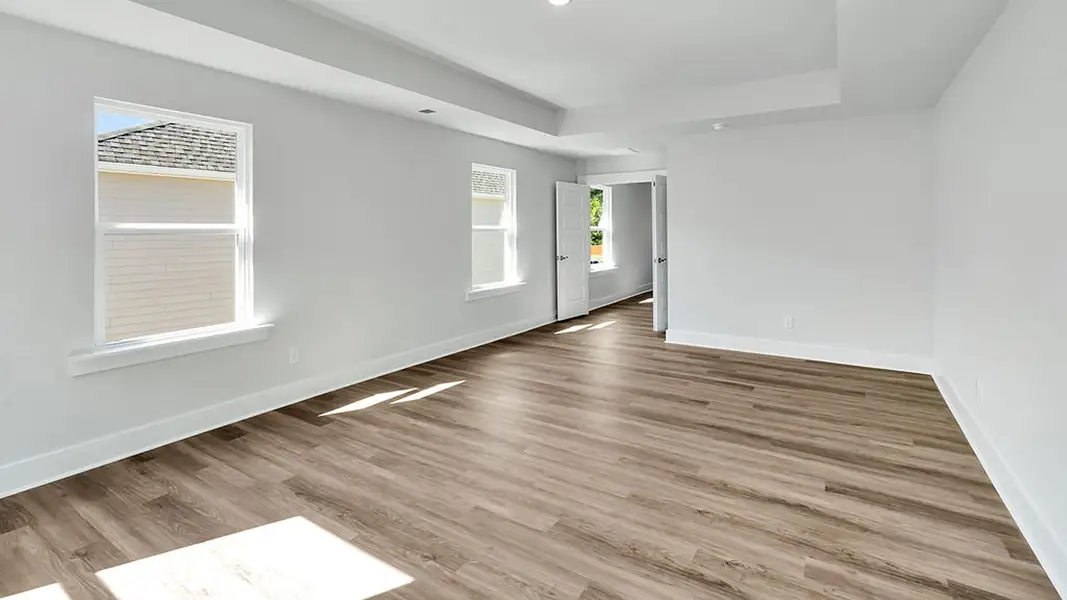 Spacious, unfurnished interior of a new home in The Haven at Indigo Preserve, Leland (Image 31).