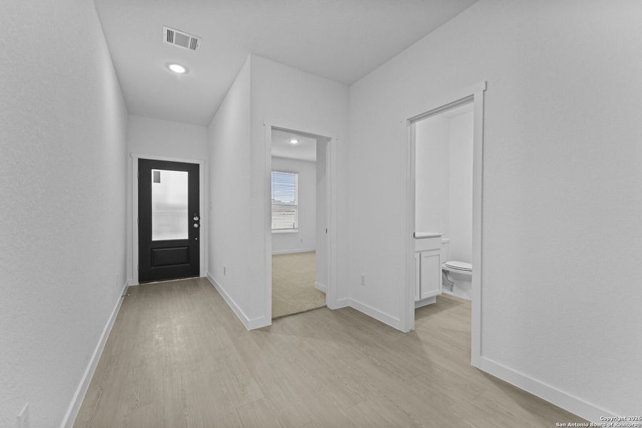 Spacious, unfurnished interior of a new home in Parkside: Coastline Collection, New Braunfels (Image 18).