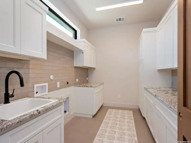 Furnished interior view inside a new home in , San Antonio (Image 17).