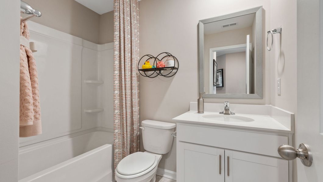 Furnished interior view inside a new home in Tanglewood Townes, Greenville (Image 15).