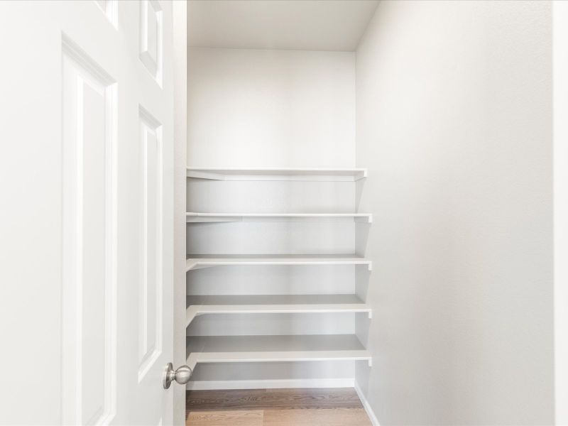 Pantry in the Wateron floorplan at a Meritage Homes community in Brighton, CO.