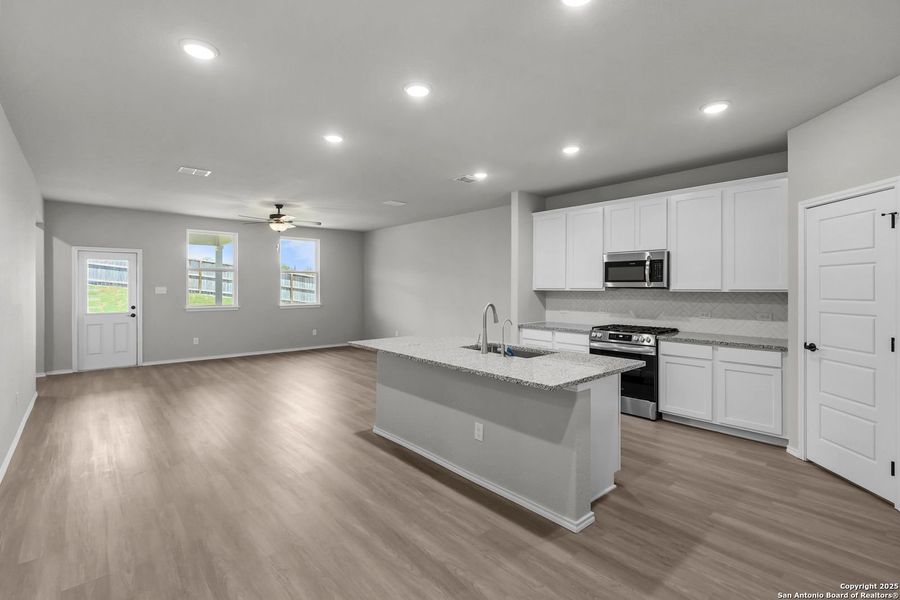 Furnished interior view inside a new home in Comanche Ridge, San Antonio (Image 25). Furnished interior view inside a new home in Comanche Ridge, San Antonio (Image 25).