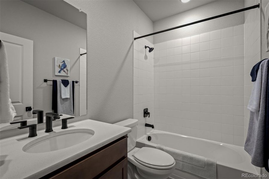 Furnished interior view inside a new home in Revel Crossing at Wolf Ranch – The Outlook Collection, Colorado Springs (Image 27).