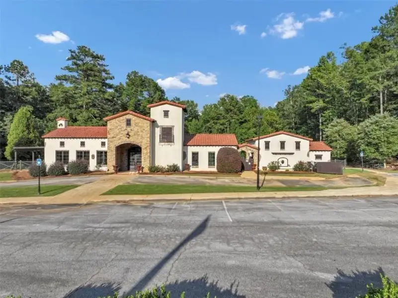 Front exterior of a new home in Tuscany Hills, Douglasville, GA, highlighting curb appeal (Image 23).