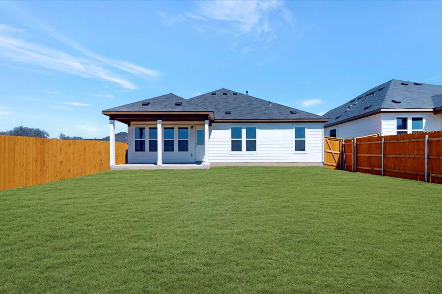 Exterior details and patio area of a home in Carillon, Manor (Image 4).