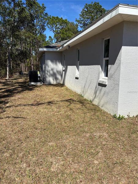 Exterior details and patio area of a home in , Citrus Springs (Image 33).