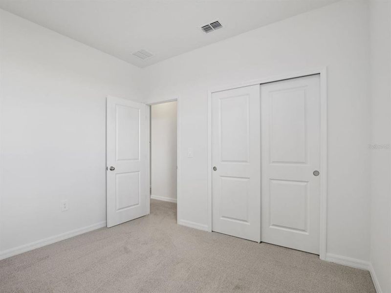 Spacious, unfurnished interior of a new home in Coasterra - Reserve Series, Palmetto (Image 20).