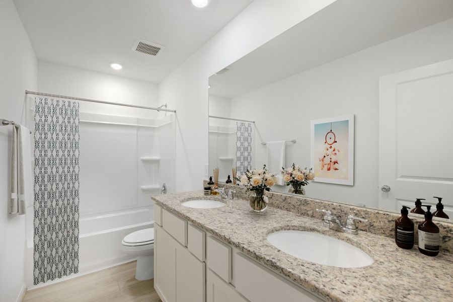 Representative furnished interior of a home built from the Walnut by Taylor Morrison in Bridge Creek 45s and 50s, Cypress (Image 17). Representative furnished interior of a home built from the Walnut by Taylor Morrison in Bridge Creek 45s and 50s, Cypress (Image 17).