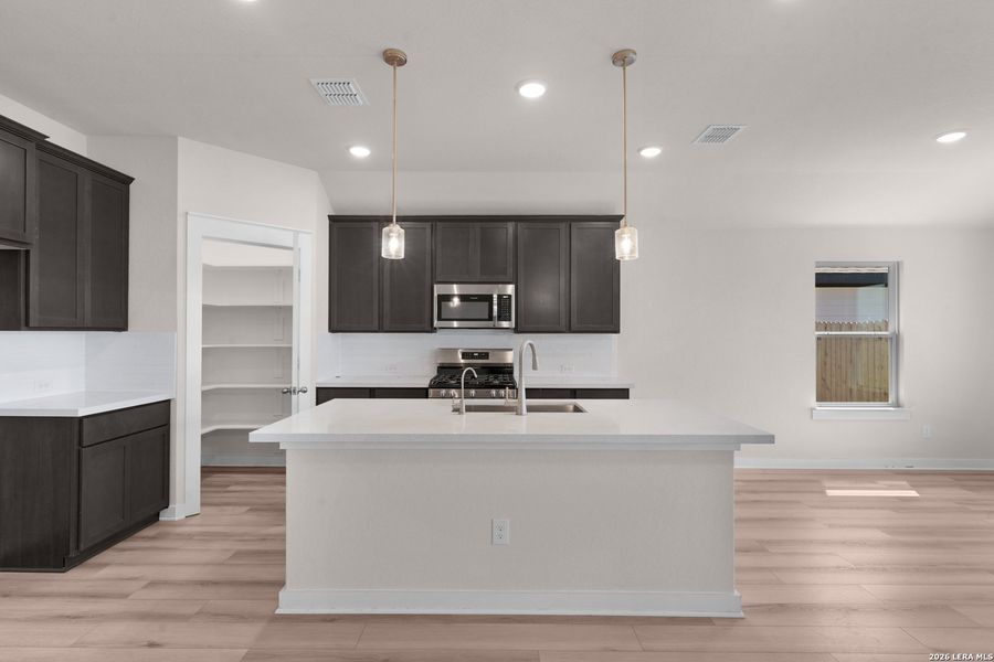 Furnished interior view inside a new home in Westridge, San Antonio (Image 7).