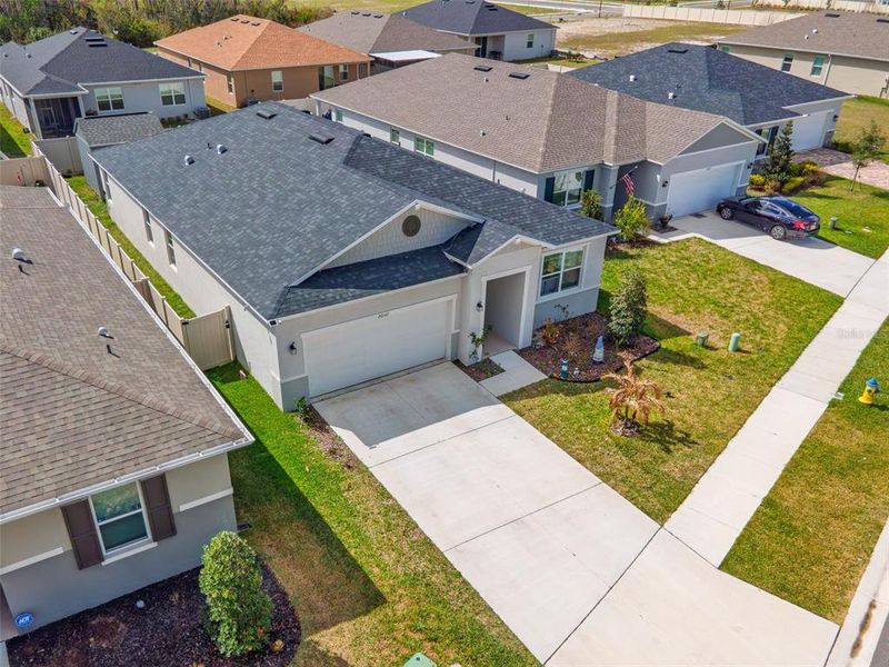 Front exterior of a new home in , Land O' Lakes, FL, highlighting curb appeal (Image 21).