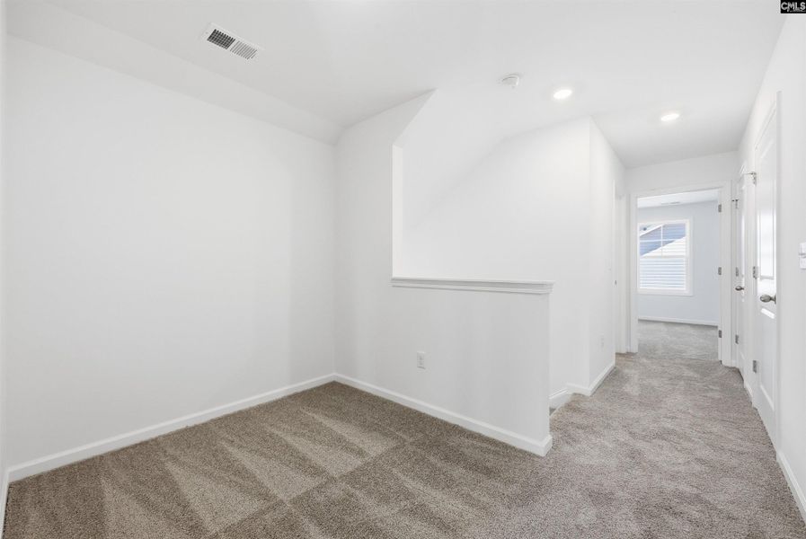Spacious, unfurnished interior of a new home in Bickley Station, Irmo (Image 13).