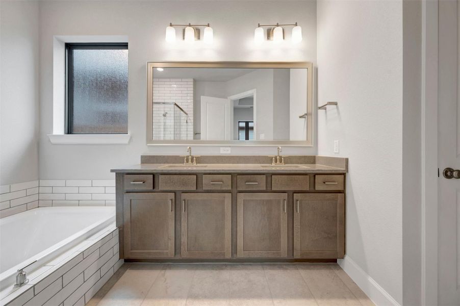 Furnished interior view inside a new home in Sienna - Landmark Row Collection, Missouri City (Image 12).