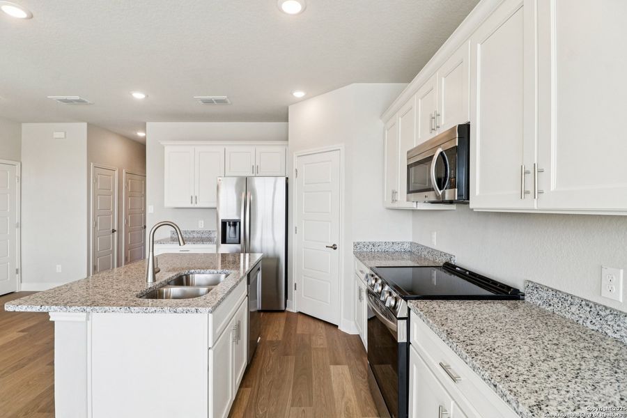 Furnished interior view inside a new home in Magnolia Village North, San Antonio (Image 6).