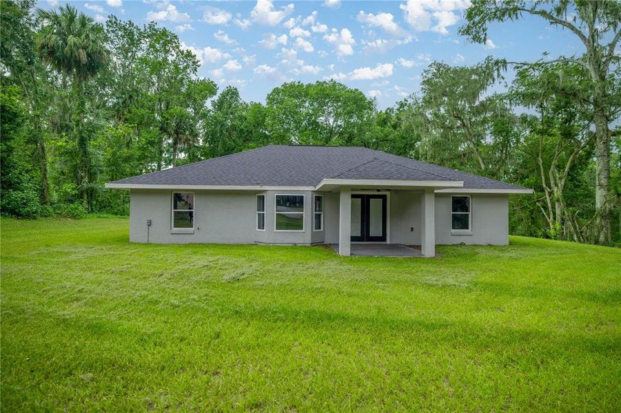 Front exterior of a new home in , Ocala, FL, highlighting curb appeal (Image 17).