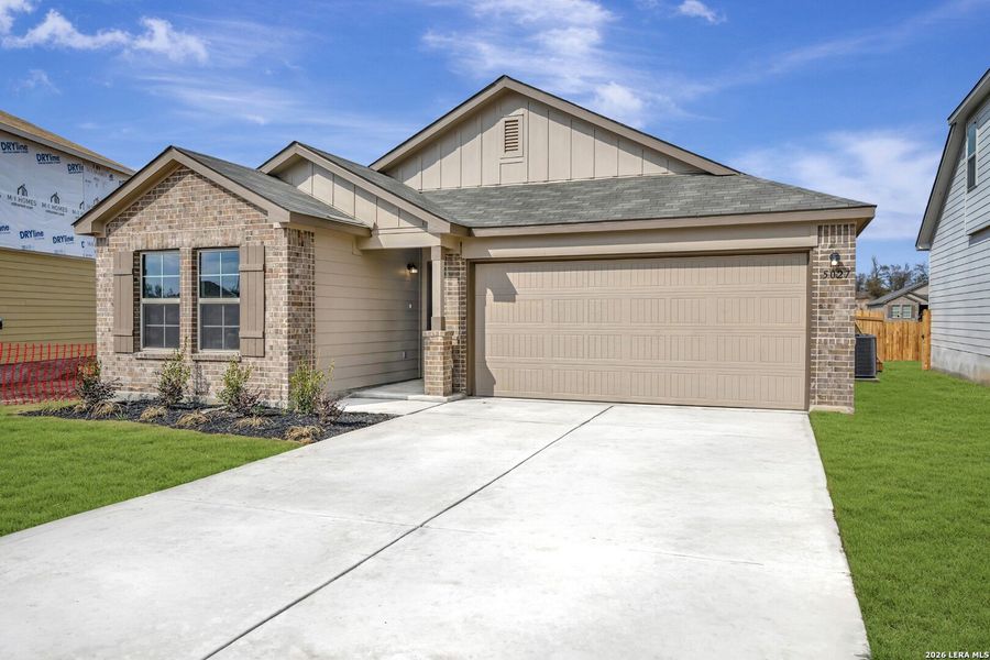 Front exterior of a new home in Agave, San Antonio, TX, highlighting curb appeal (Image 26). Front exterior of a new home in Agave, San Antonio, TX, highlighting curb appeal (Image 26).