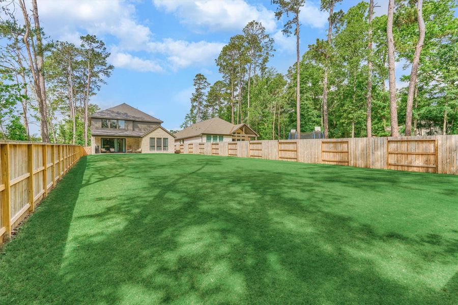 Discover serene privacy in this stunning home, boasting a lush backyard with no rear neighbors for a perfect blend of tranquility and space.