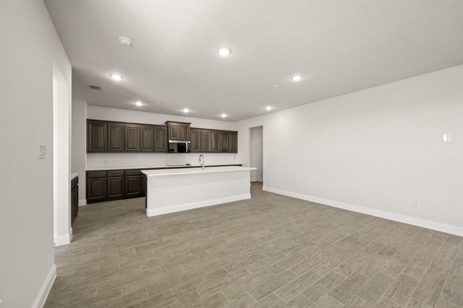 Representative exterior photo of a completed home built from the Radcliffe by Impression Homes in Timberbrook, Justin, TX (Image 9).