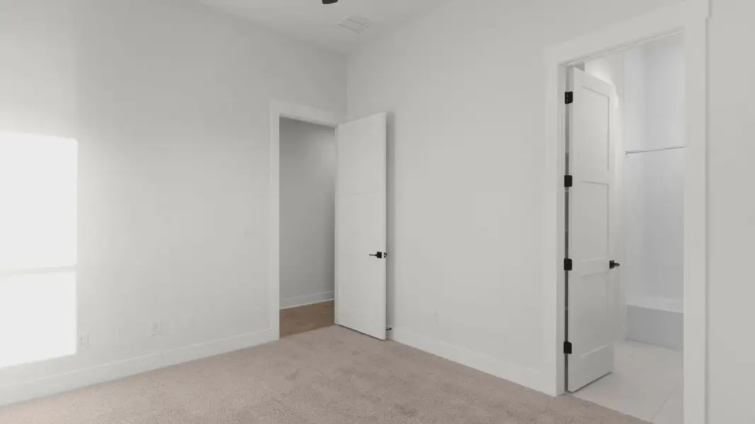 Representative unfurnished interior of a home built from the Merritt by Chesmar Homes in Feathergrass, Florence (Image 28).