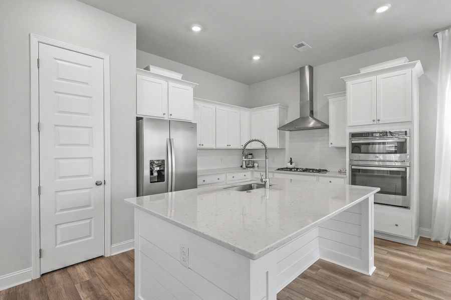 Furnished interior view inside a new home in Limehouse Village: Row Collection, Summerville (Image 41).