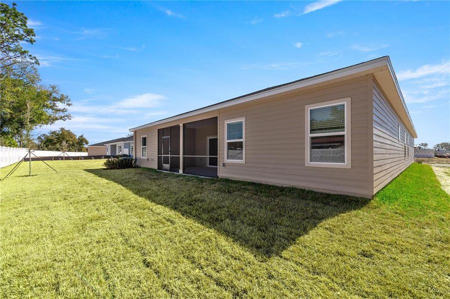Exterior details and patio area of a home in Trailhead Landing, Alachua (Image 4).