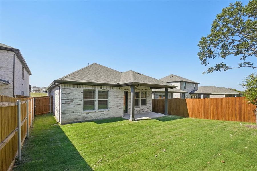 Exterior details and patio area of a home in Eastridge - Spring Series, McKinney (Image 25). Exterior details and patio area of a home in Eastridge - Spring Series, McKinney (Image 25).