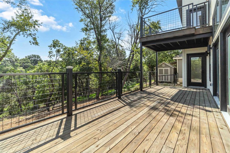 A scenic view of majestic, mature oak trees creates a serene and natural backdrop. A scenic view of majestic, mature oak trees creates a serene and natural backdrop.