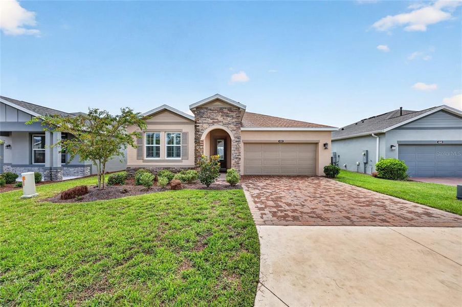 Front exterior of a new home in , Ocala, FL, highlighting curb appeal (Image 23).