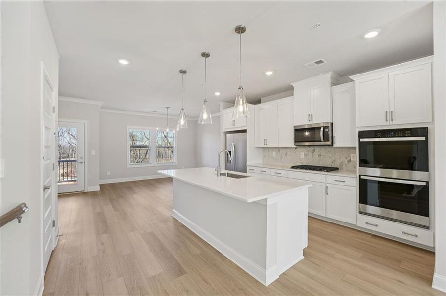 Furnished interior view inside a new home in Hemingway - Highland Series, Cumming (Image 8).