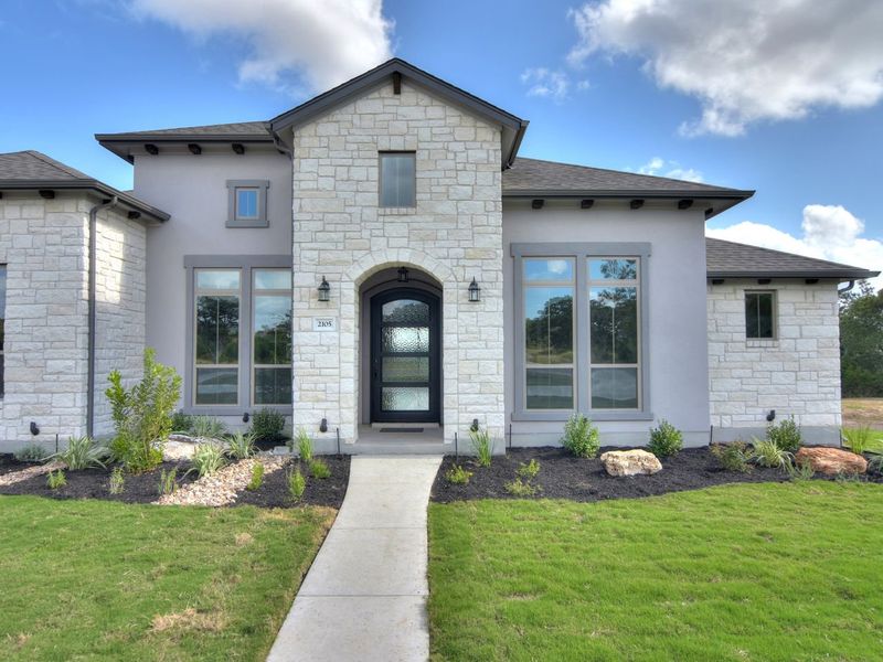 Representative exterior photo of a completed home built from the Avalon by Giddens Homes in Scofield Farms Estates, Georgetown, TX (Image 28).