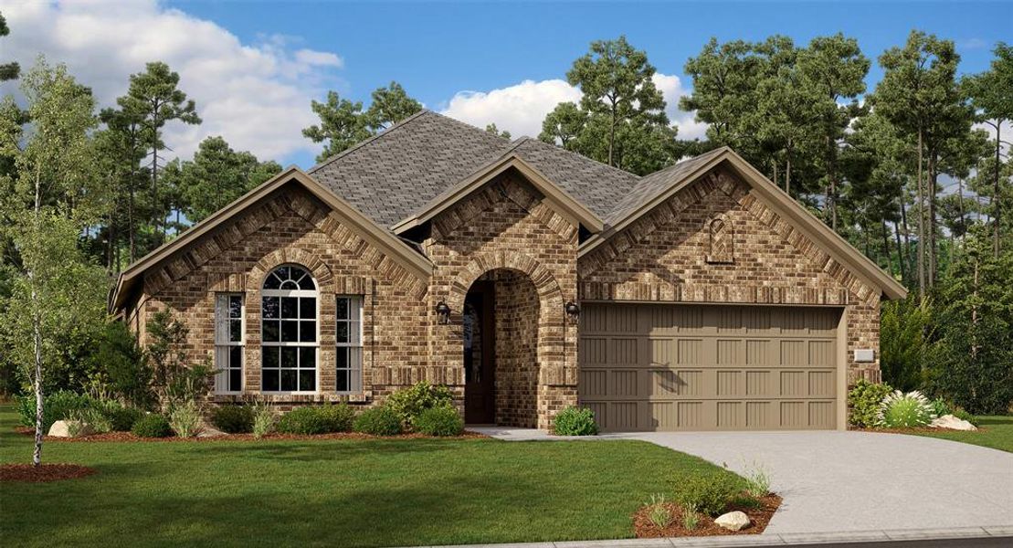 View of front of home featuring a front yard and a garage