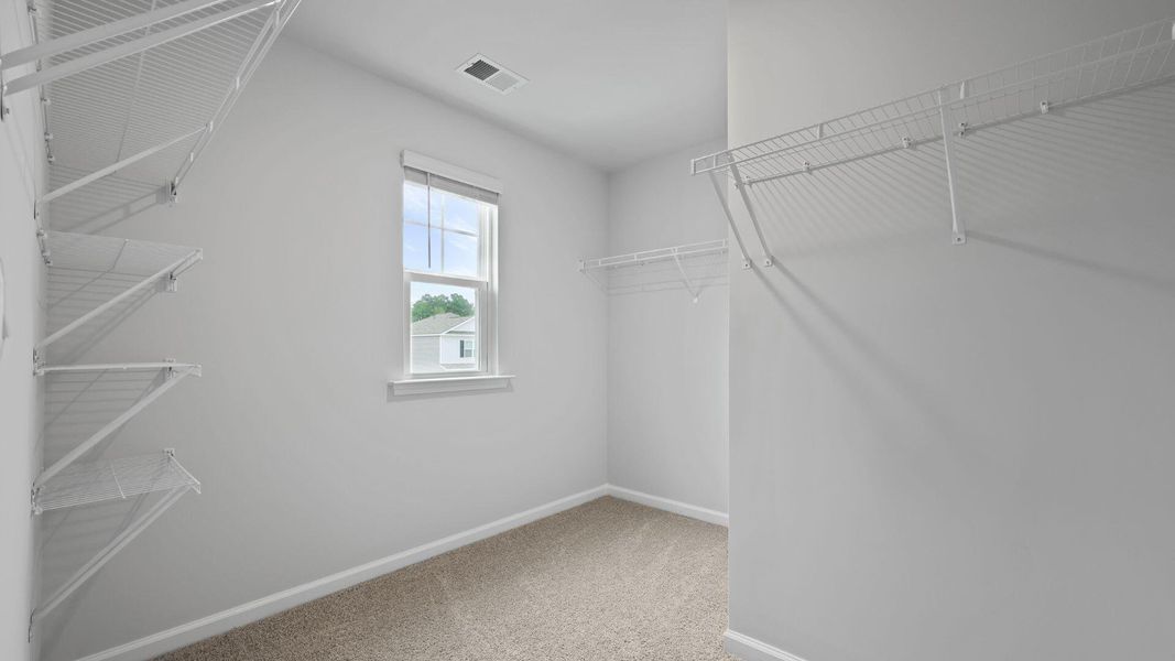 Spacious, unfurnished interior of a new home in Pine Hills at Cane Bay, Summerville (Image 29). Spacious, unfurnished interior of a new home in Pine Hills at Cane Bay, Summerville (Image 29).