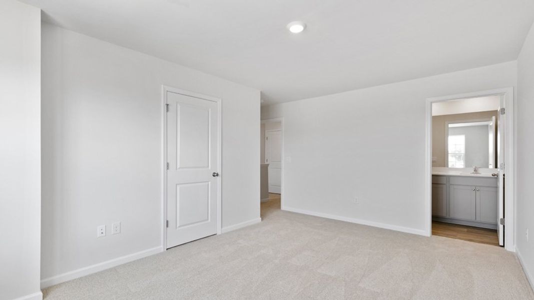 Spacious, unfurnished interior of a new home in The Townes at Bexford, Willow Spring (Image 12).