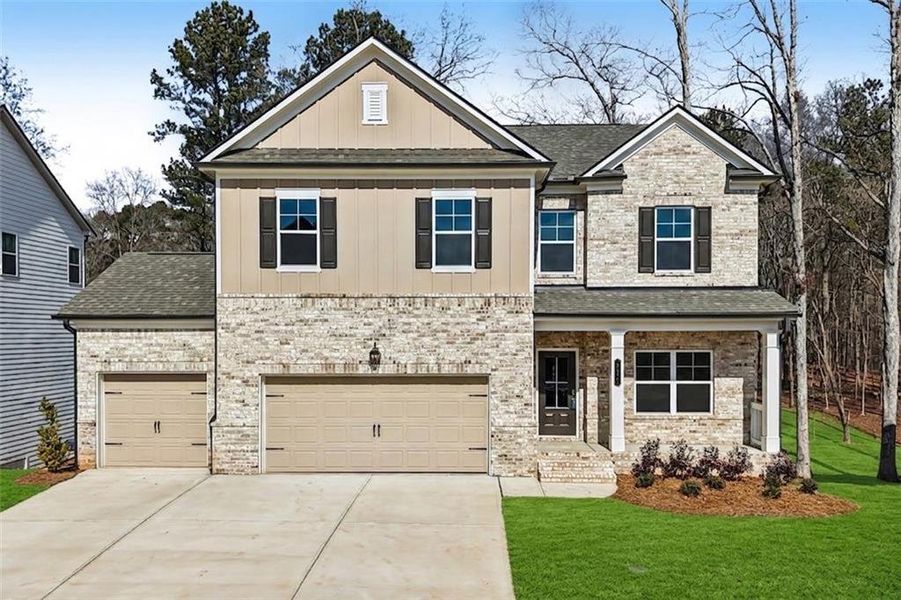 Front exterior of a new home in Rosewood Lake Estates, Hoschton, GA, highlighting curb appeal (Image 28). Front exterior of a new home in Rosewood Lake Estates, Hoschton, GA, highlighting curb appeal (Image 28).