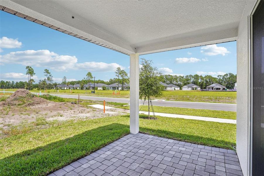 Exterior details and patio area of a home in Ridgehaven - Villas, Ormond Beach (Image 19).