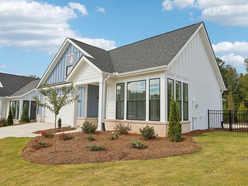 Front exterior of a new home in , Holly Springs, GA, highlighting curb appeal (Image 26).