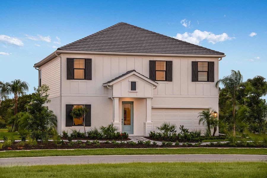 Representative exterior photo of a completed home built from the Legacy by Neal Communities in Windward, Sarasota, FL (Image 2). Representative exterior photo of a completed home built from the Legacy by Neal Communities in Windward, Sarasota, FL (Image 2).
