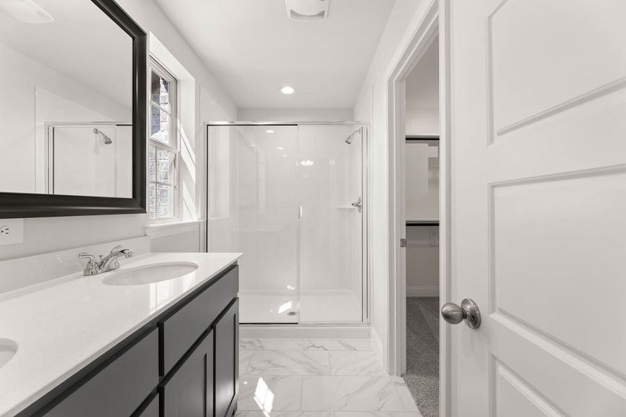 Front exterior of a new home in Main Street Village, Mansfield, TX, highlighting curb appeal (Image 18). Front exterior of a new home in Main Street Village, Mansfield, TX, highlighting curb appeal (Image 18).