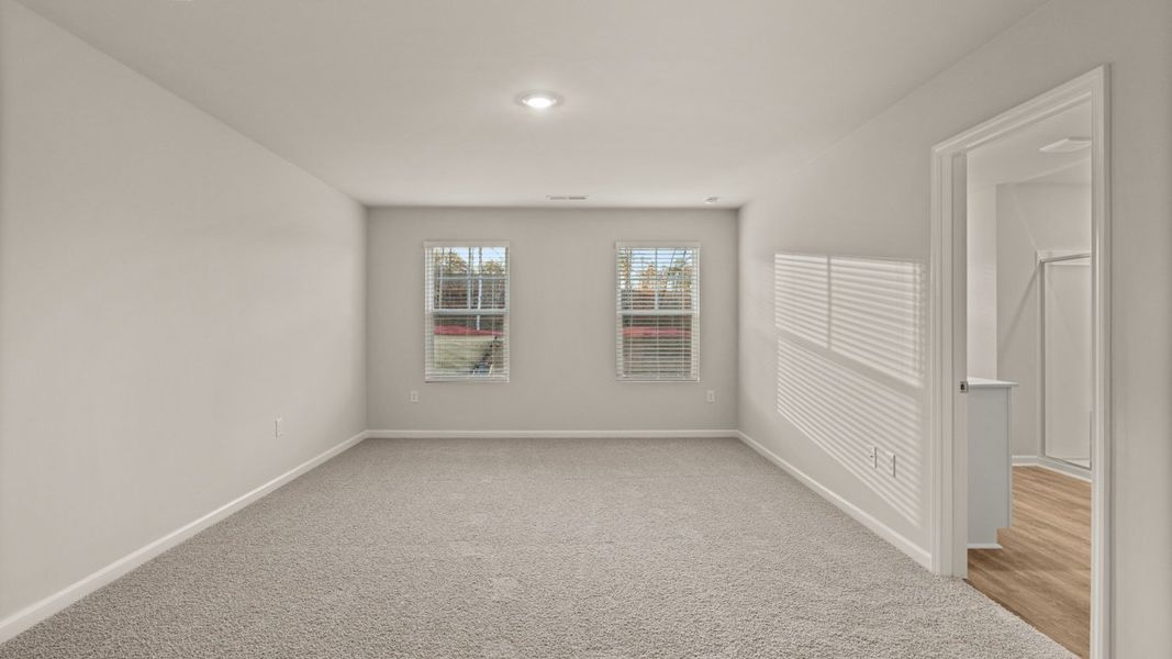 Representative unfurnished interior of a home built from the Hayden by D.R. Horton in Brooks Station, Dacula (Image 19).