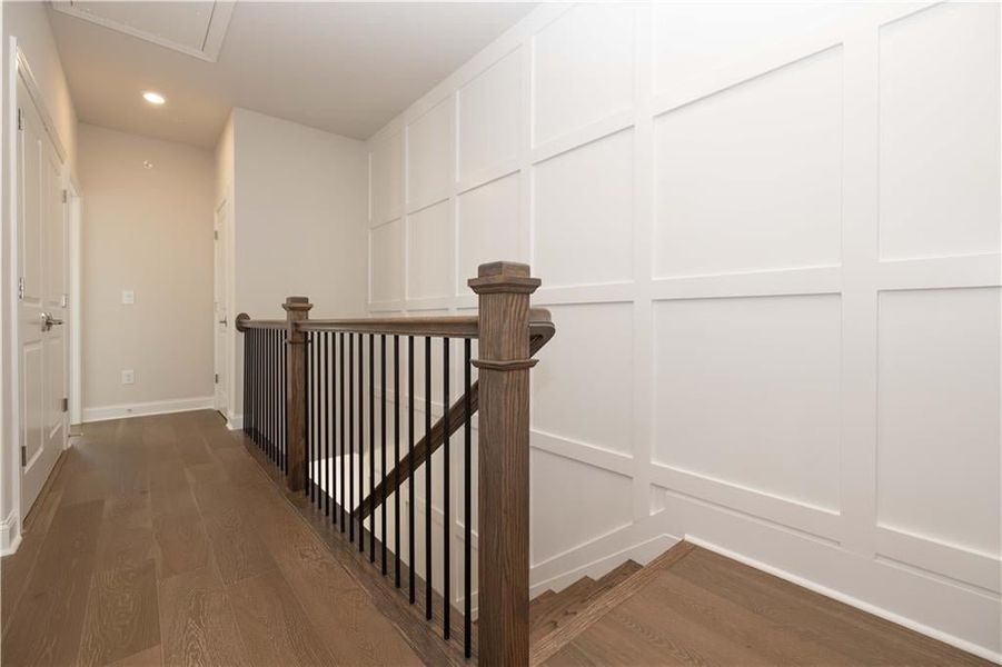 Staircase up to the third level to Primary bedroom and secondary bedroom with laundry. Image is of previously built Chamberlain
