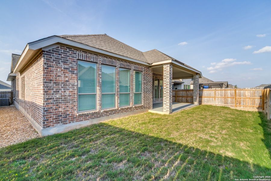 Exterior details and patio area of a home in , New Braunfels (Image 16).