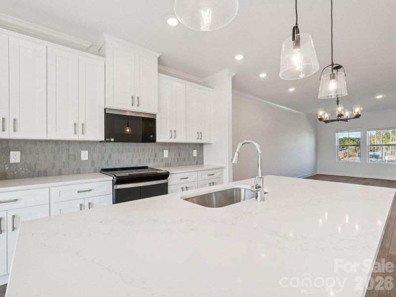 Photo is not of the actual home, but is an inspirational photo of builder’s model home and may depict options, furnishings, and/or decorator features that are not included