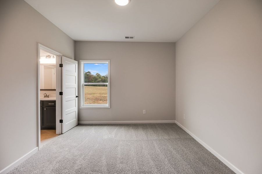 Spacious, unfurnished interior of a new home in Parmer Farms, Roopville (Image 28).