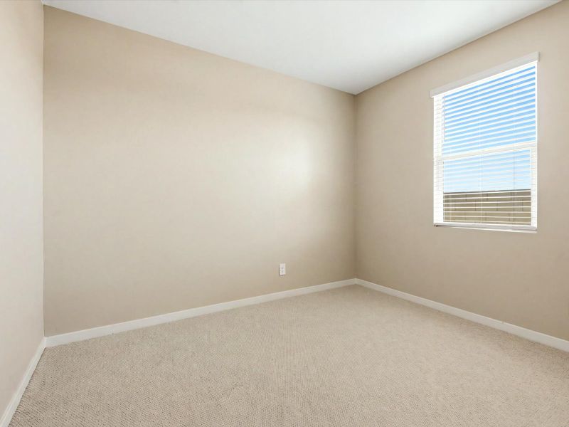 Spacious, unfurnished interior of a new home in White Tank Foothills Signature Series, Waddell (Image 16).