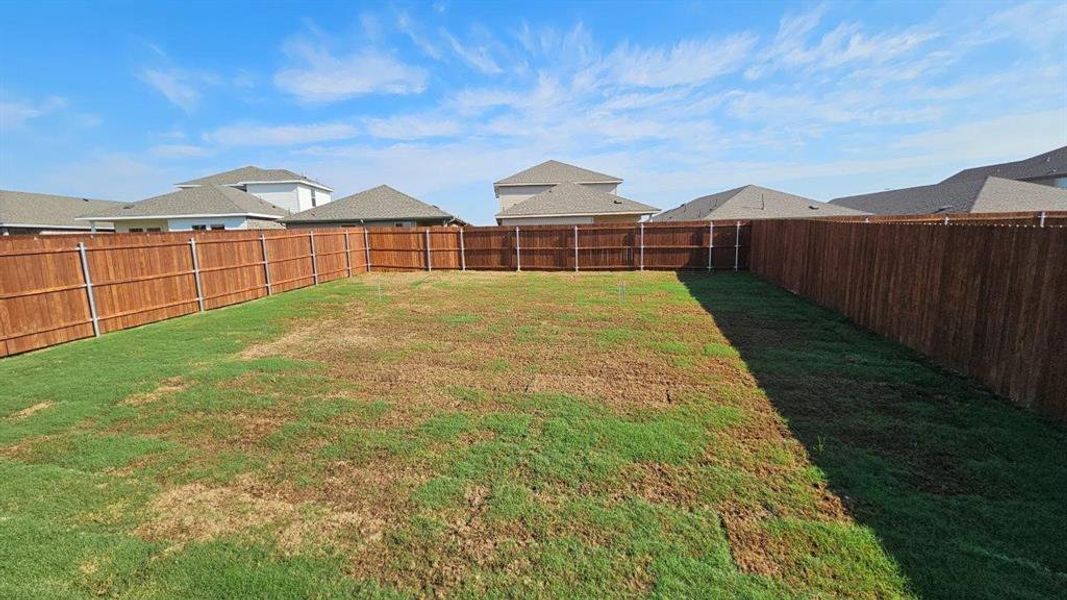 Exterior details and patio area of a home in Monarch at the Meadows, Ponder (Image 3). Exterior details and patio area of a home in Monarch at the Meadows, Ponder (Image 3).