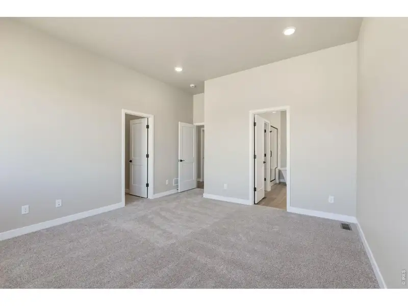 Spacious, unfurnished interior of a new home in Highlands Preserve, Mead (Image 15).