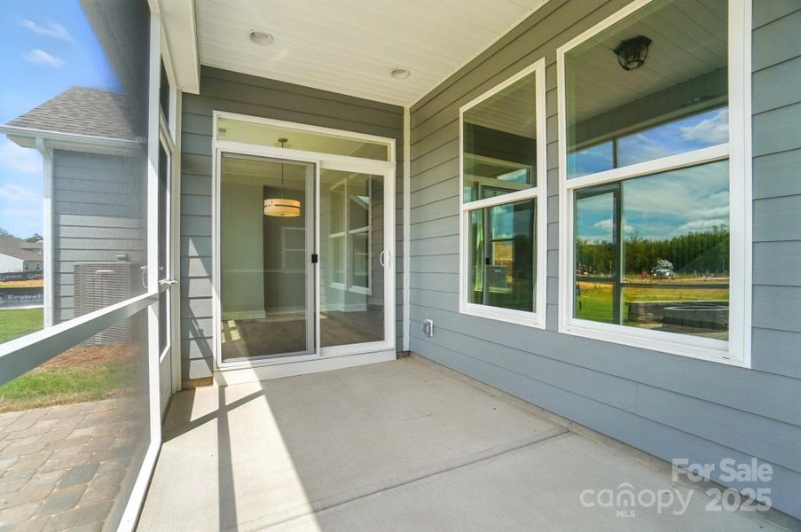 Front exterior of a new home in Heritage - 55+ Community, Indian Trail, NC, highlighting curb appeal (Image 22).