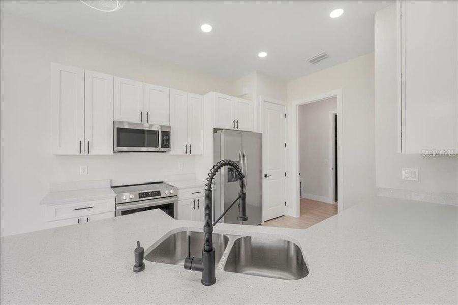 Furnished interior view inside a new home in , Lehigh Acres (Image 5).