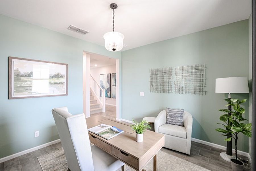 A room with a table and chairs. A room with a table and chairs.
