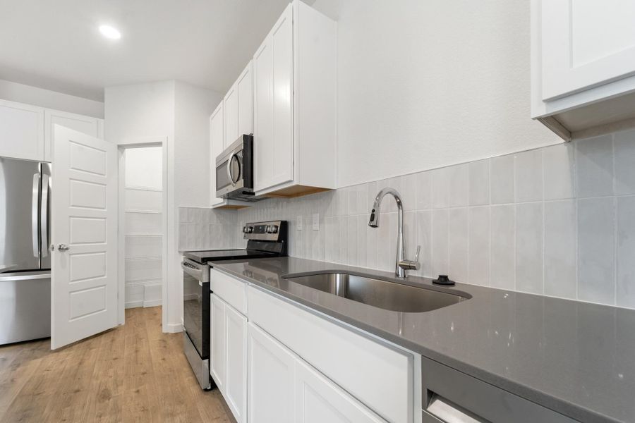 Furnished interior view inside a new home in Liberty Draw, Evans (Image 8).
